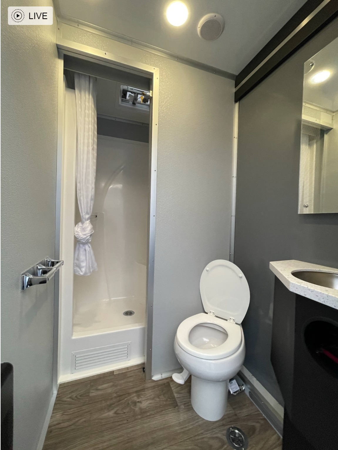 VIP Trailers 3 station shower restroom combo trailer interior